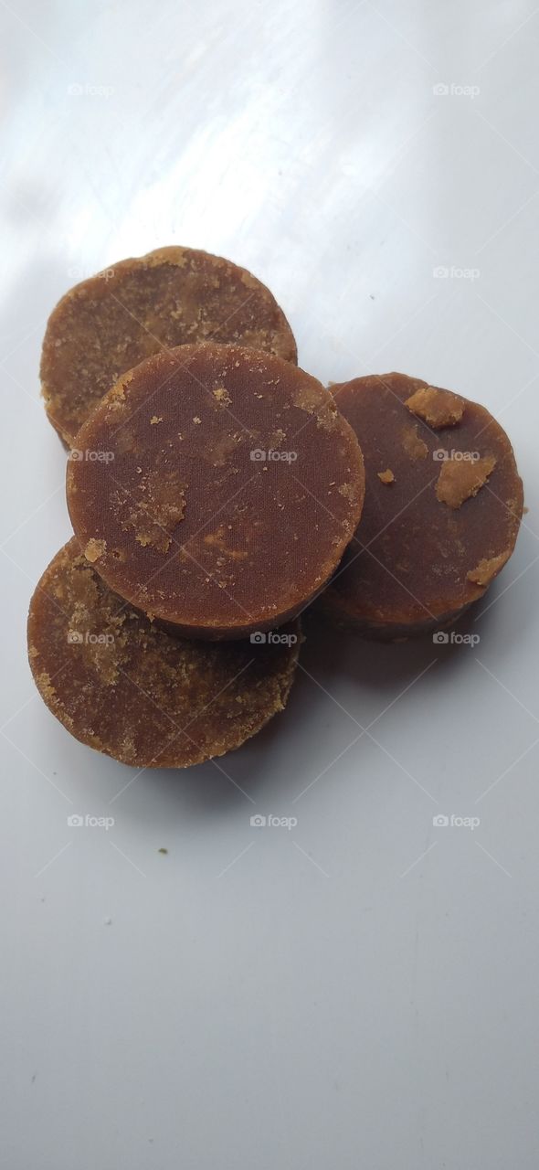 Javanese sugar is another name for brown sugar. Generally brown sugar has a shape like a tube or cylinder, and is light brown in color.