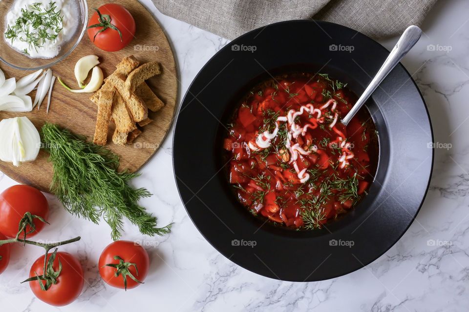 Russian traditional soup borscht and appetizer