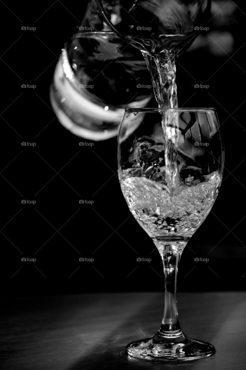 Water. Water being poured into a glass