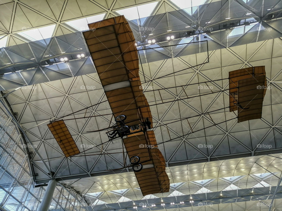 A replica of the Brothers Wright aircraft in the Hong Kong International Airport