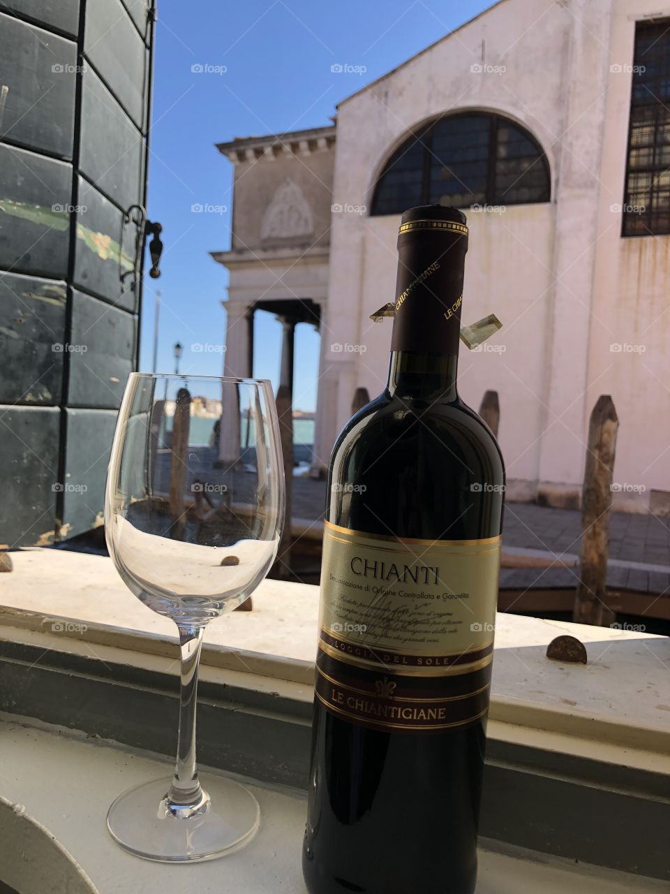 Wine at a Venetian window in Italy 2018