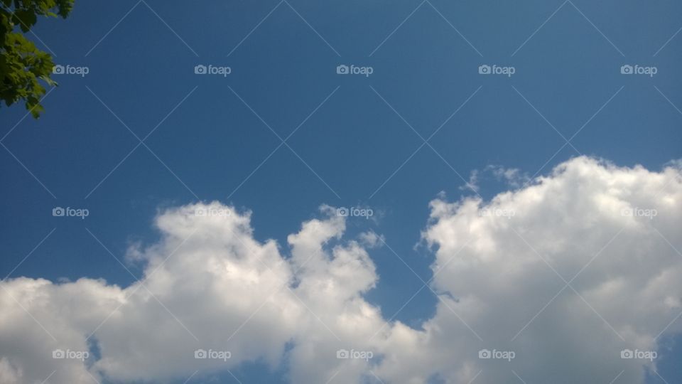 Big clouds over the beach