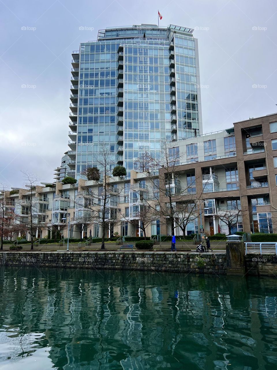 View of Marinaside Crescent from a dock at False Creek Harbour in Downtown Vancouver