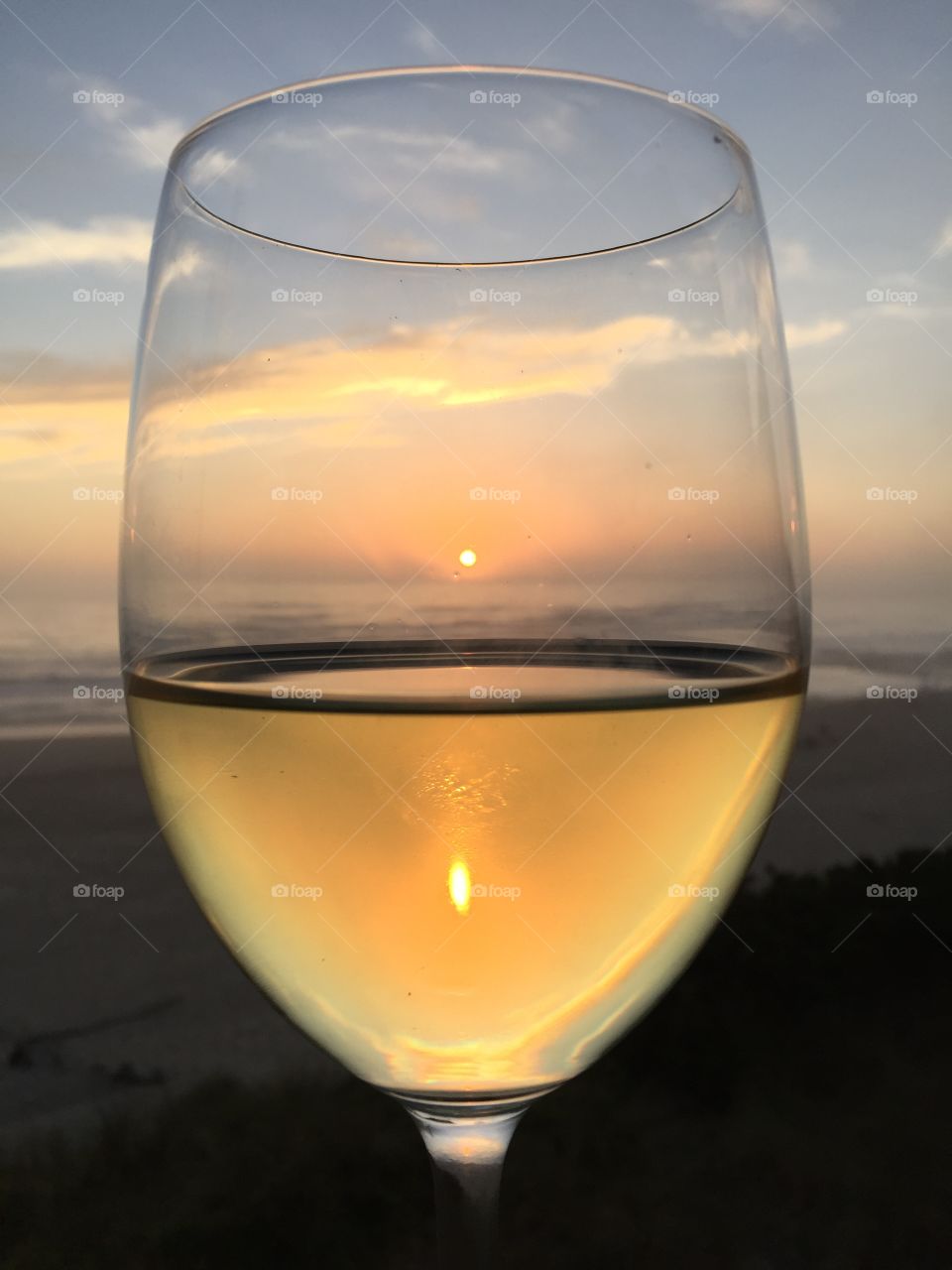 Sit down with a glass of wine and relax as you watch the sunset 