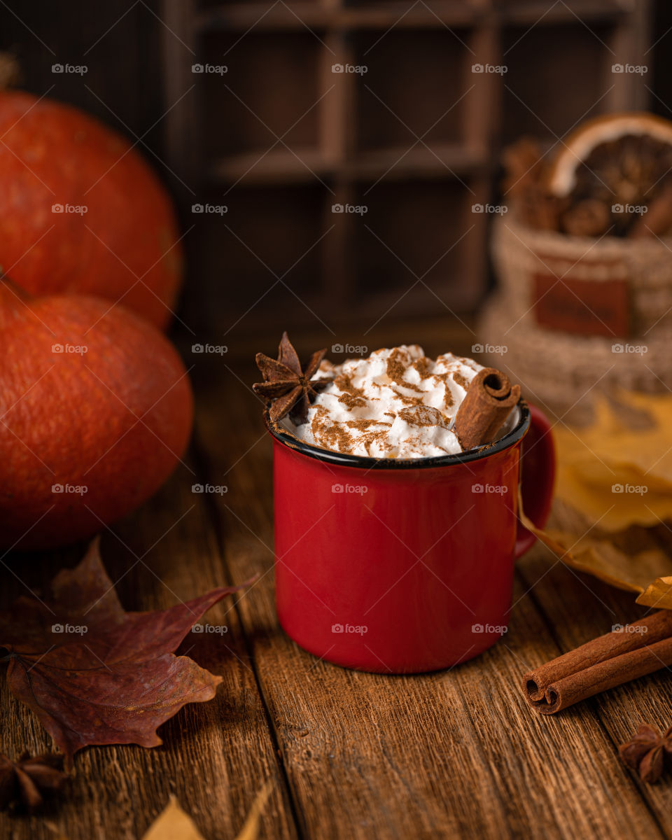 Spicy pumpkin latte in a red mug