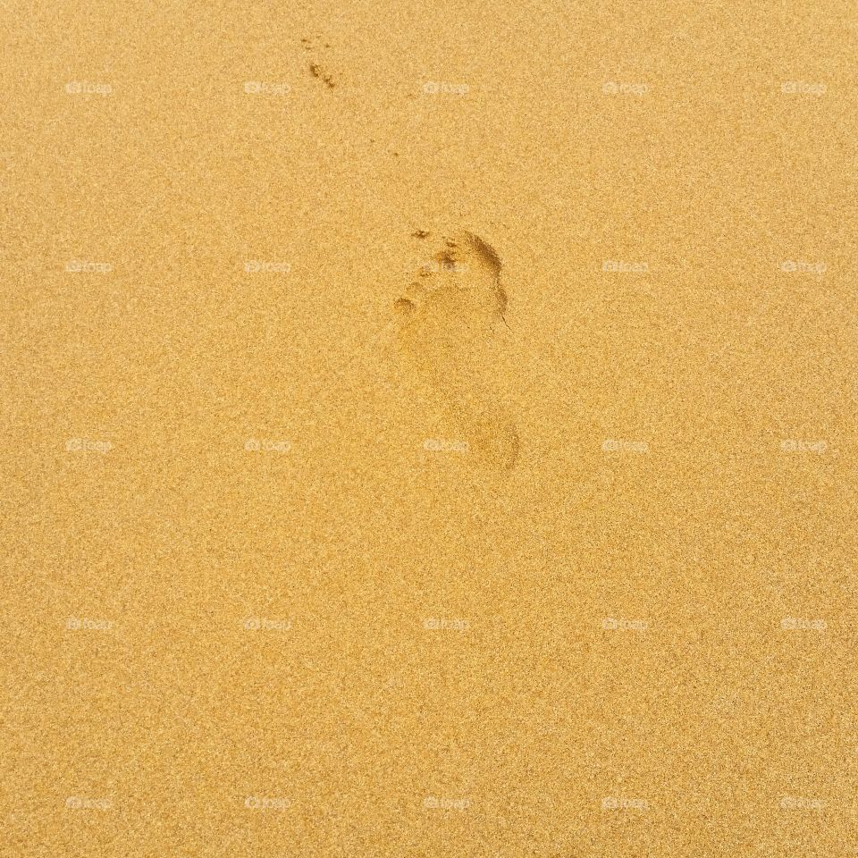 Foot print at 12 Apostles . A small step in Heaven.  12 Apostles beach