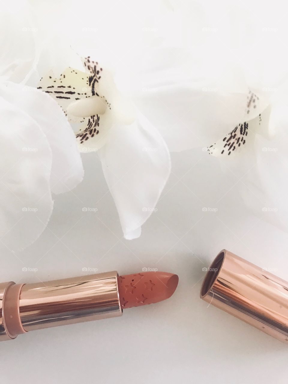 Lipstick with flower. Makeup photo. Lipstick photo. 
