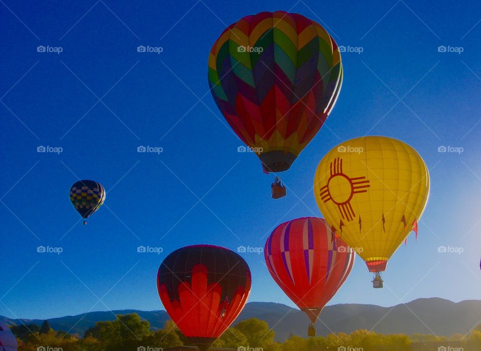 Multi colored air balloon against clear sky