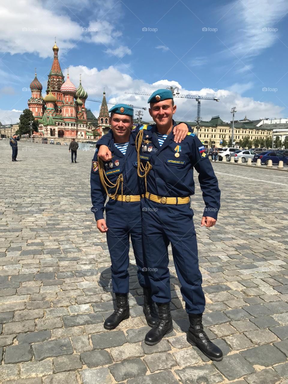 Young men in uniform in red square