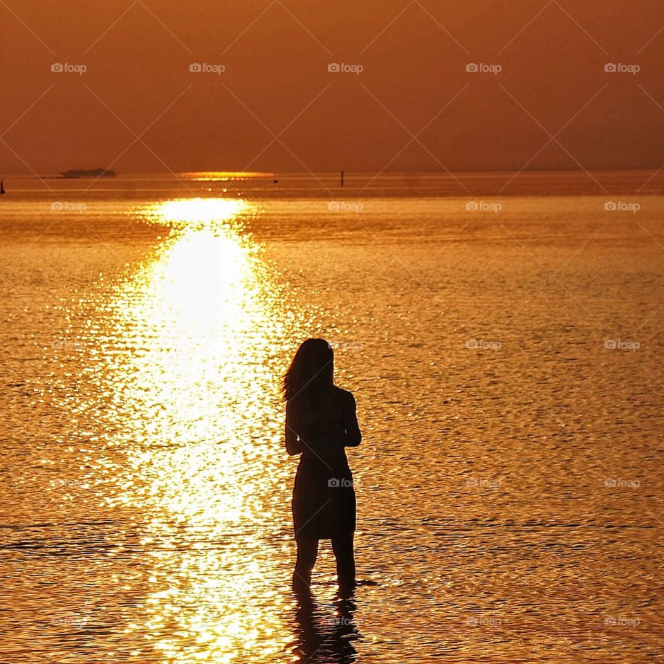 Girl in sunset