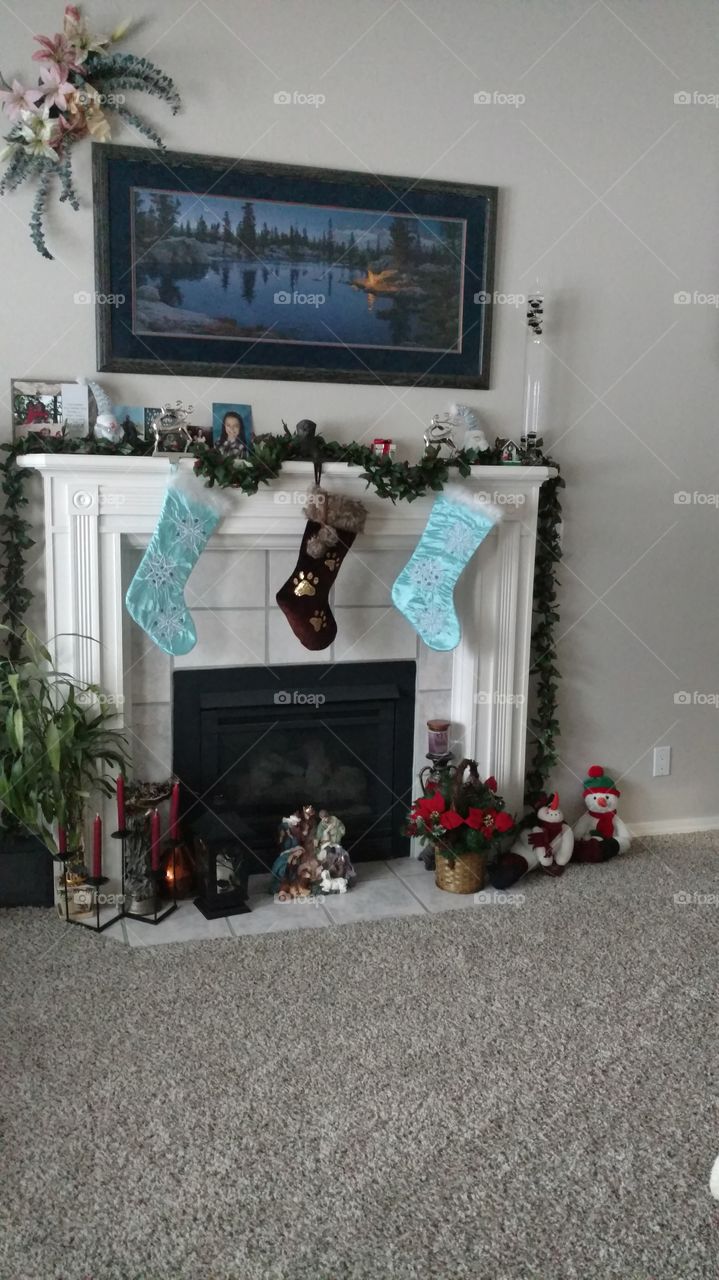Christmas stockings hung on the fireplace