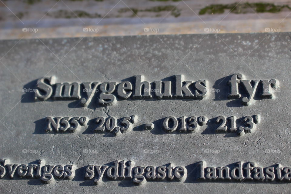 Sign Smygehuk lighthouse, geographic coordinate.