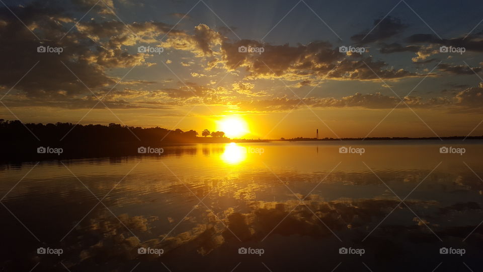 Reflection of sunset on lake