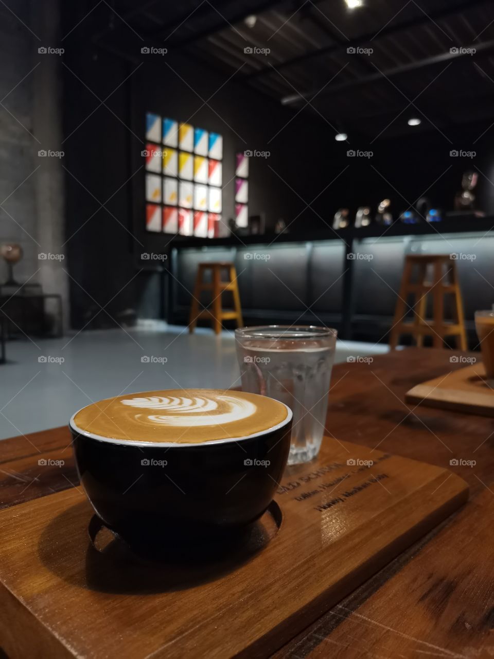 Flat White Coffee in a Cup with Blurred Background
