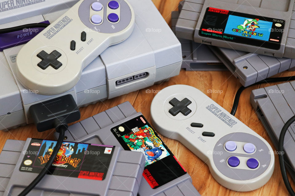 Super Nintendo with games and controllers