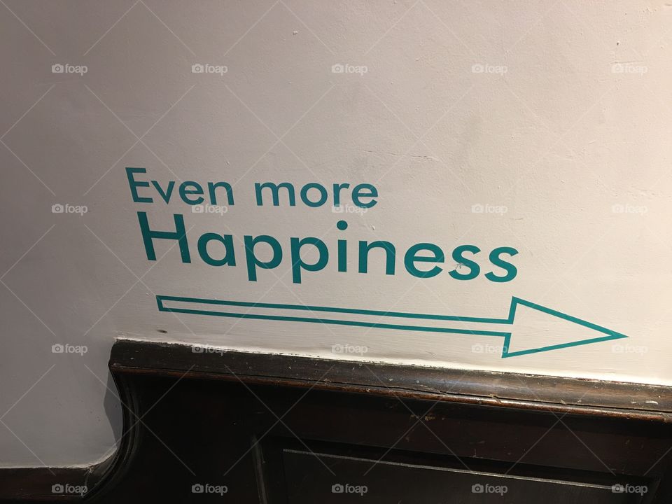 Even more Happiness ...  direction found in a shop stairwell directing you to merchandise 