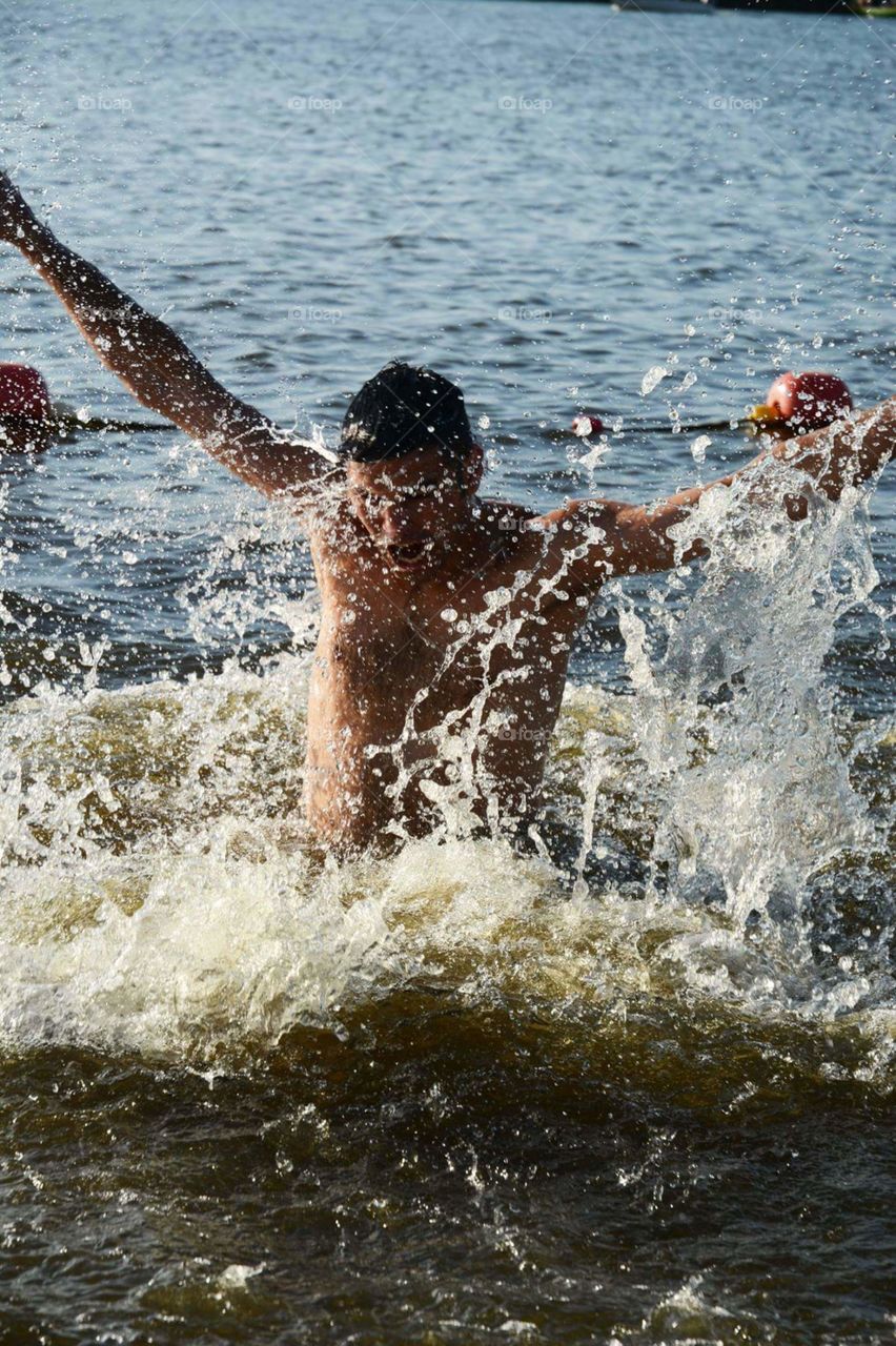 man enjoying water in the sea