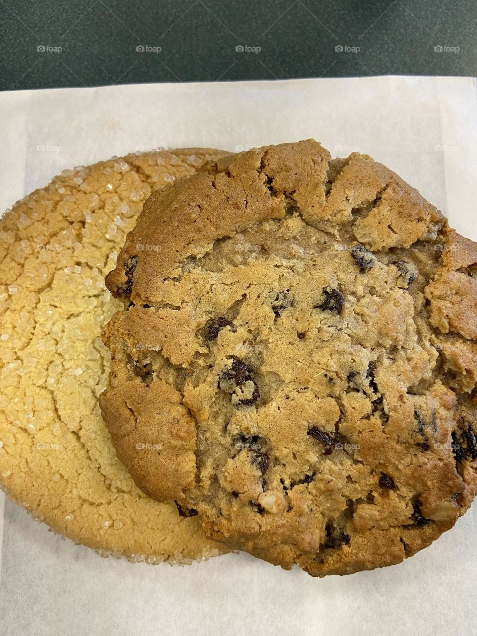 Overlapping cookies, a sugar cookie (one of my favorites) and an oatmeal raisin, both from the bakery cafe at Barnes & Noble bookstore. 
