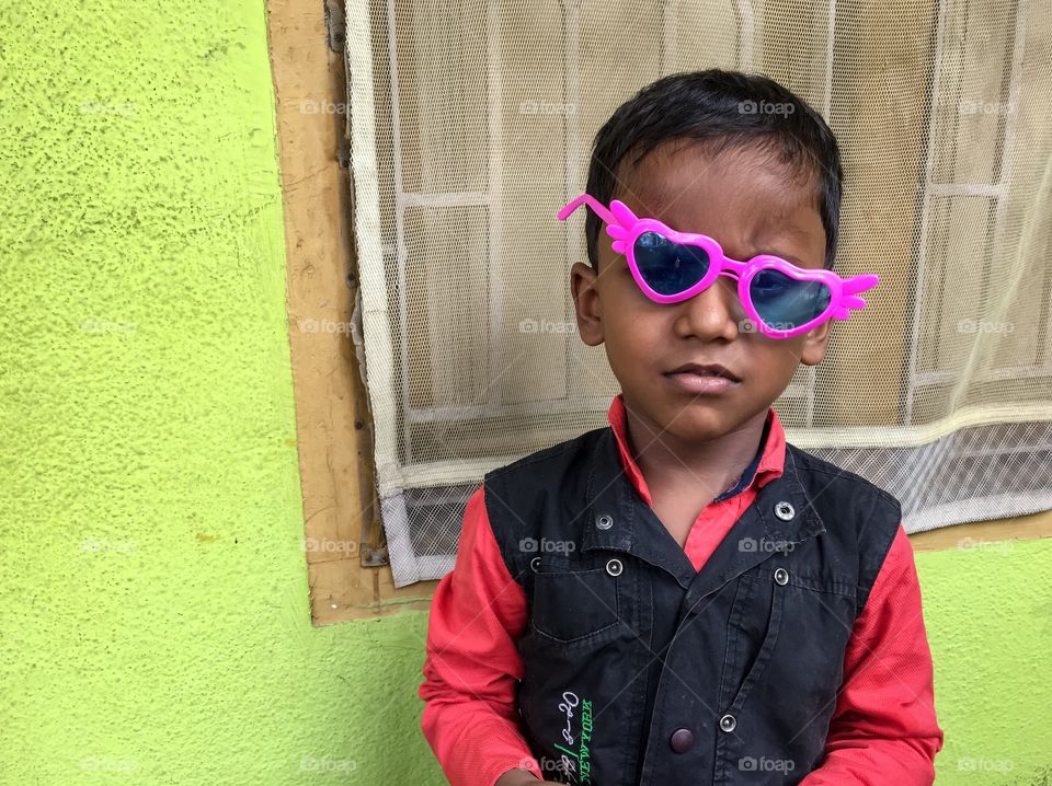 Indian kid with a funny googles