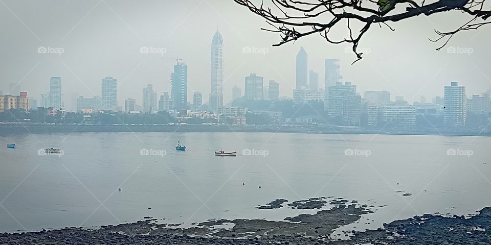 #seashore#hajialiarea#noperson#city#water#buildings#boats#cityview#skyscrapers#