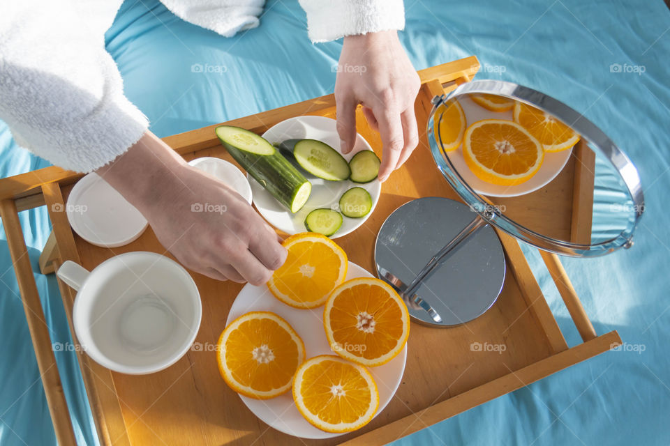 Man eating breakfast with vegetables and fruits