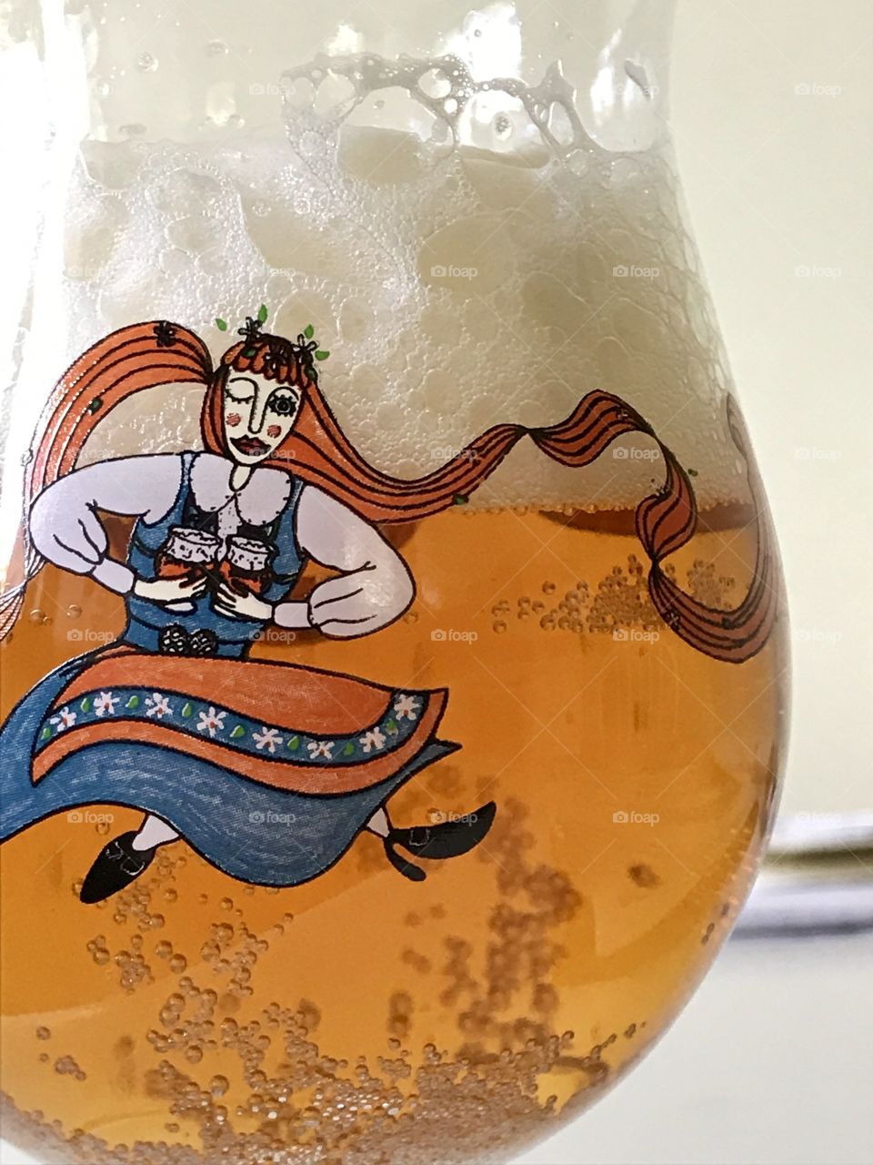 Beer glass with beer in it