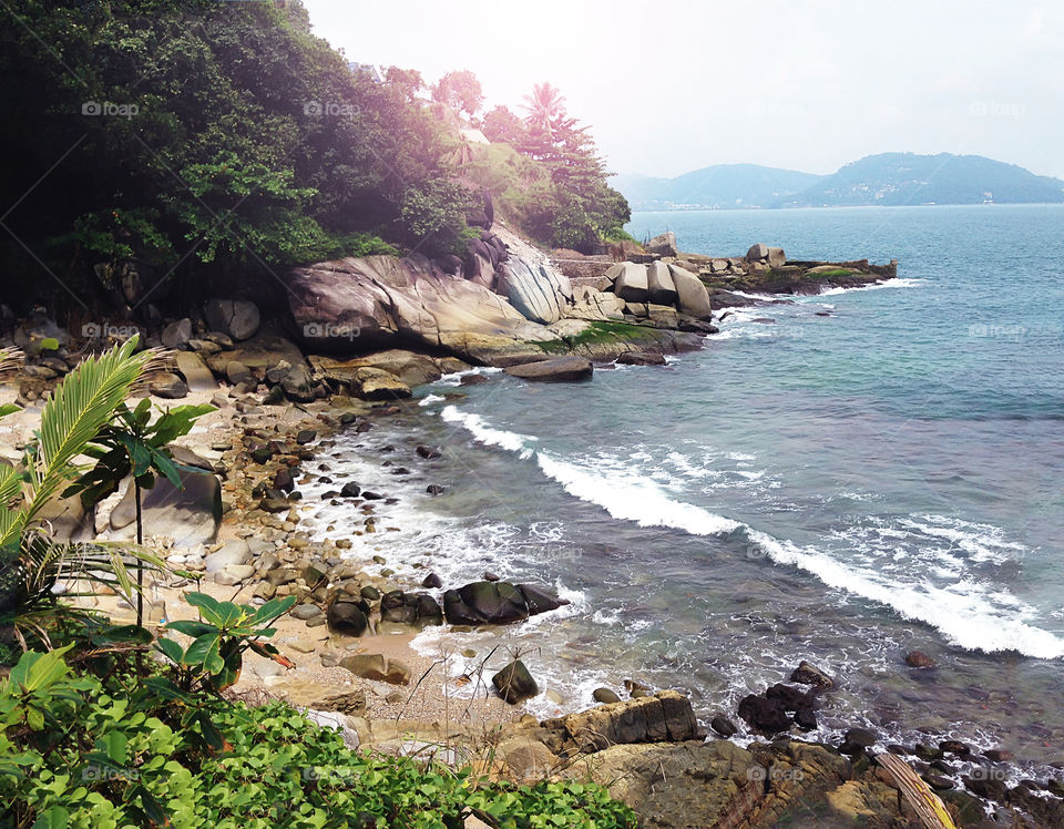 Beautiful view of the tropical rocky beach landscape in Thailand 