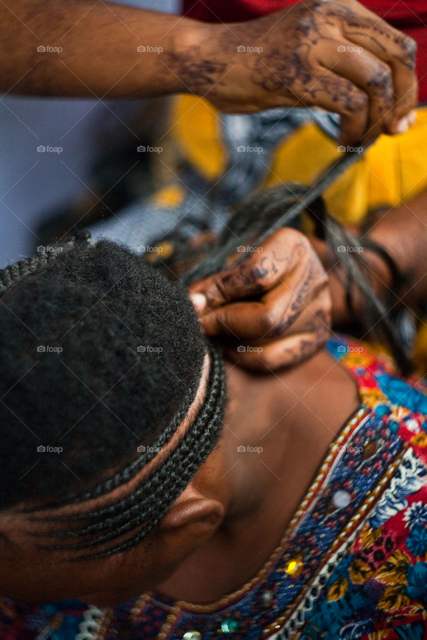 weaving braids in Tanzania