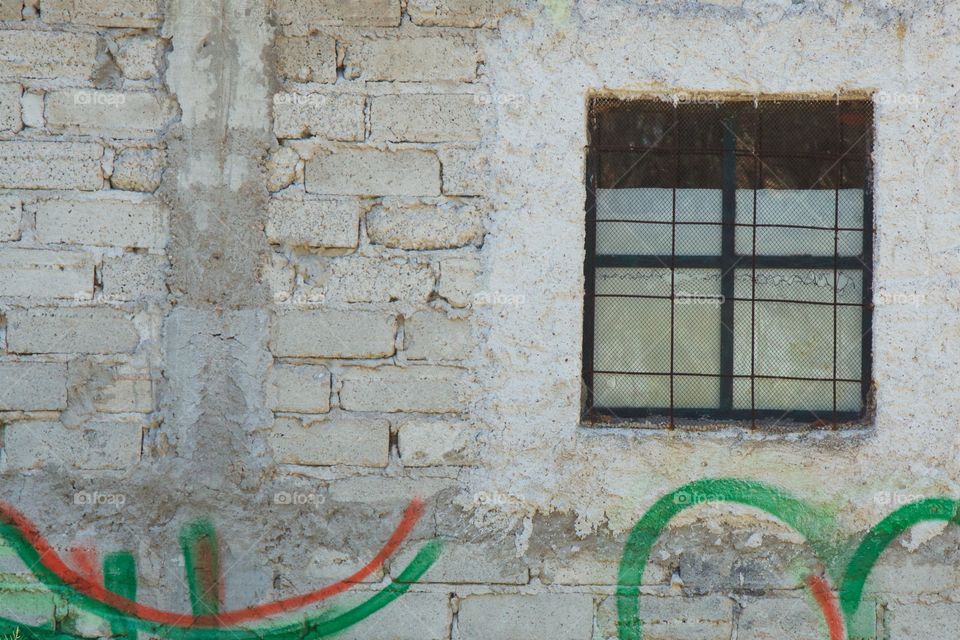A window and wall of a house in San Miguel de Allende, Mexican