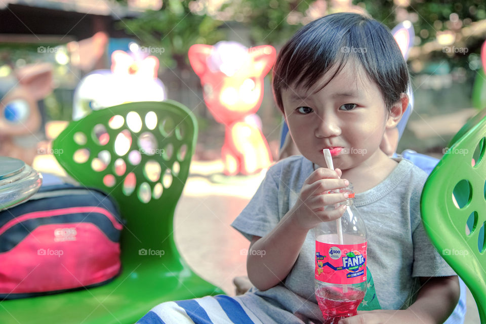 here, enjoy my cola drink in the bottles after a long walk