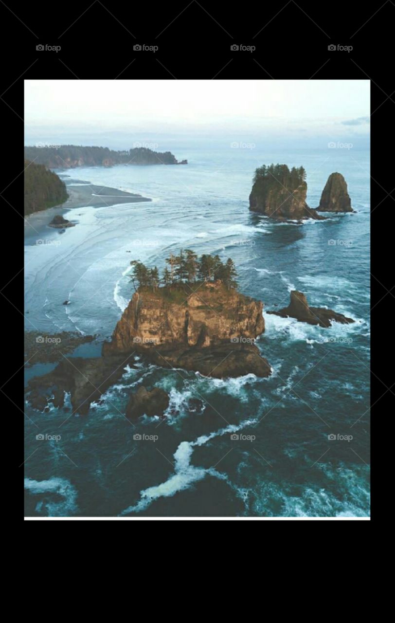 This is beautiful pictures of LA push Washington over ocean This is noise free HD high quality HDR photo shoot from air having water and blue view contains the plant and stone