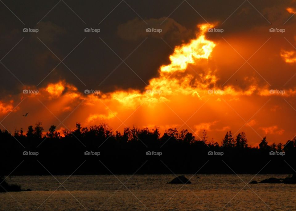 Colorful Sunset behind stormy clouds