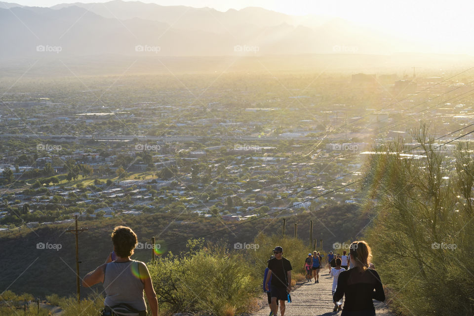 Early morning sunlight shining on hikers