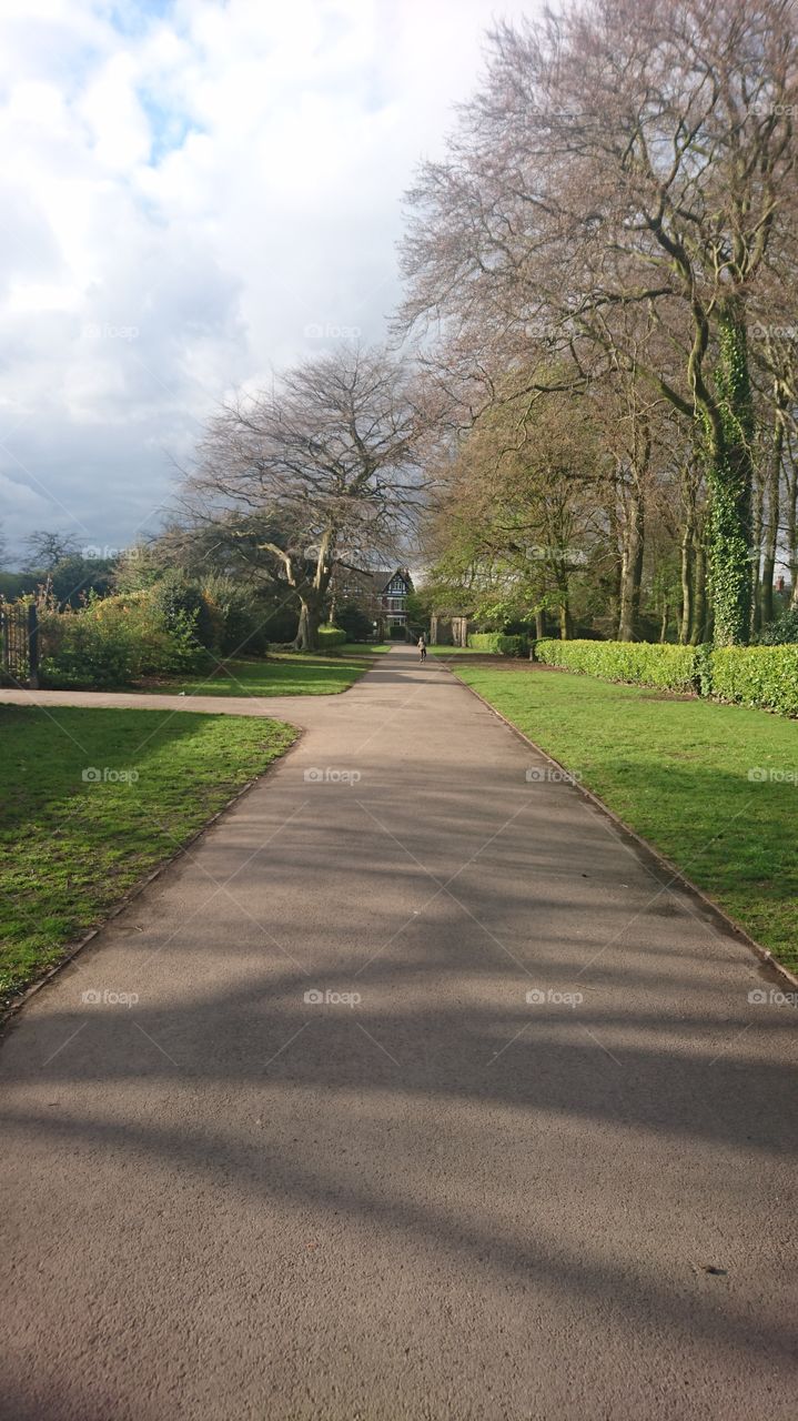 park way with boy on the scooter