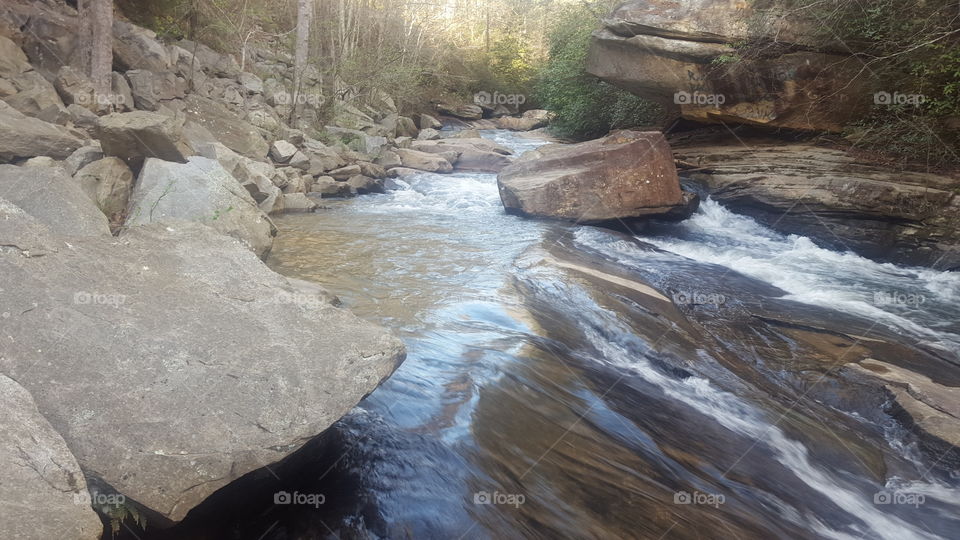 flowing creek over rocks