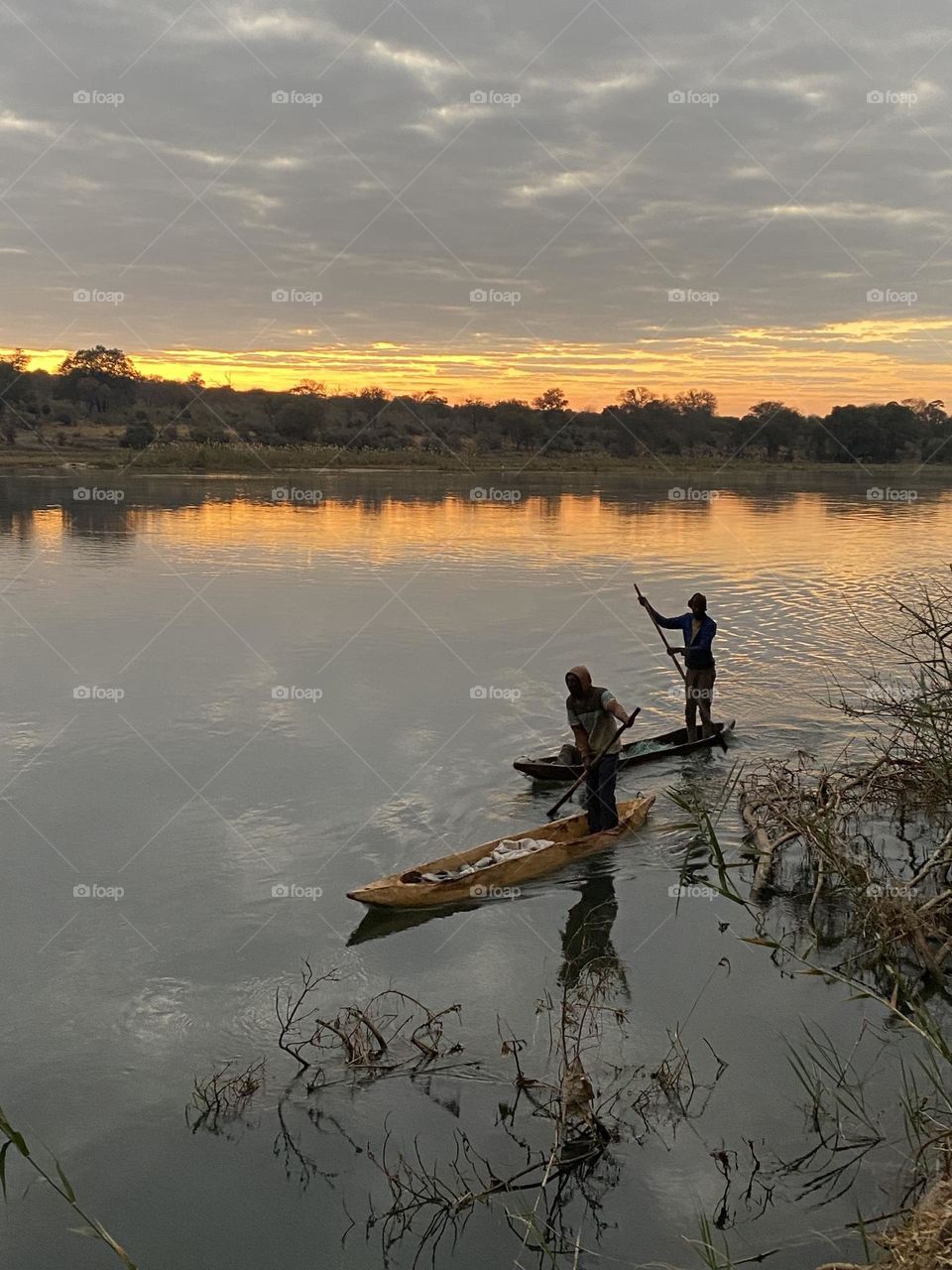 Paddlers on the Kavango River, Namibia