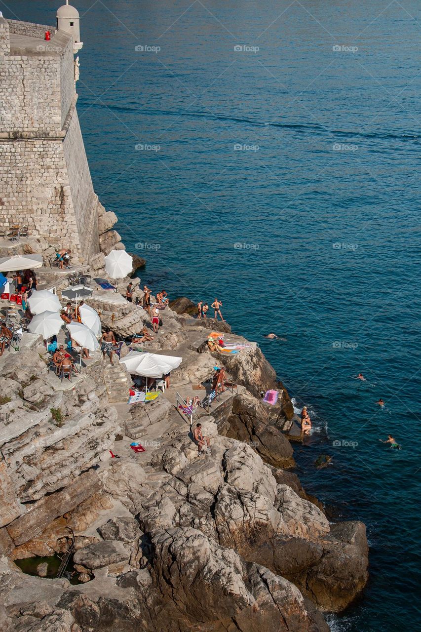Natural swimming pool and rocky beach 