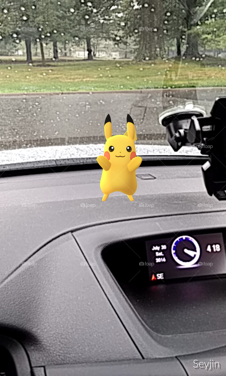 Pikachu jumping in my car