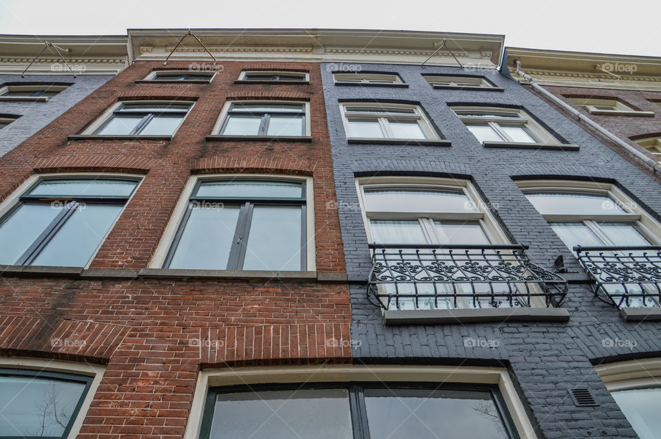 Close Up Of A Old Canalhouse At Amsterdam The Netherlands