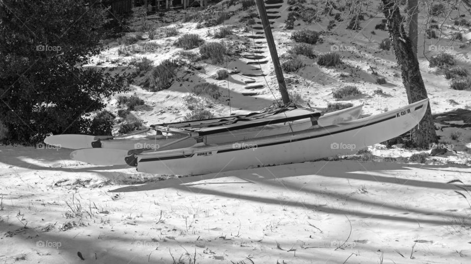 Beached boat after a snowstorm 