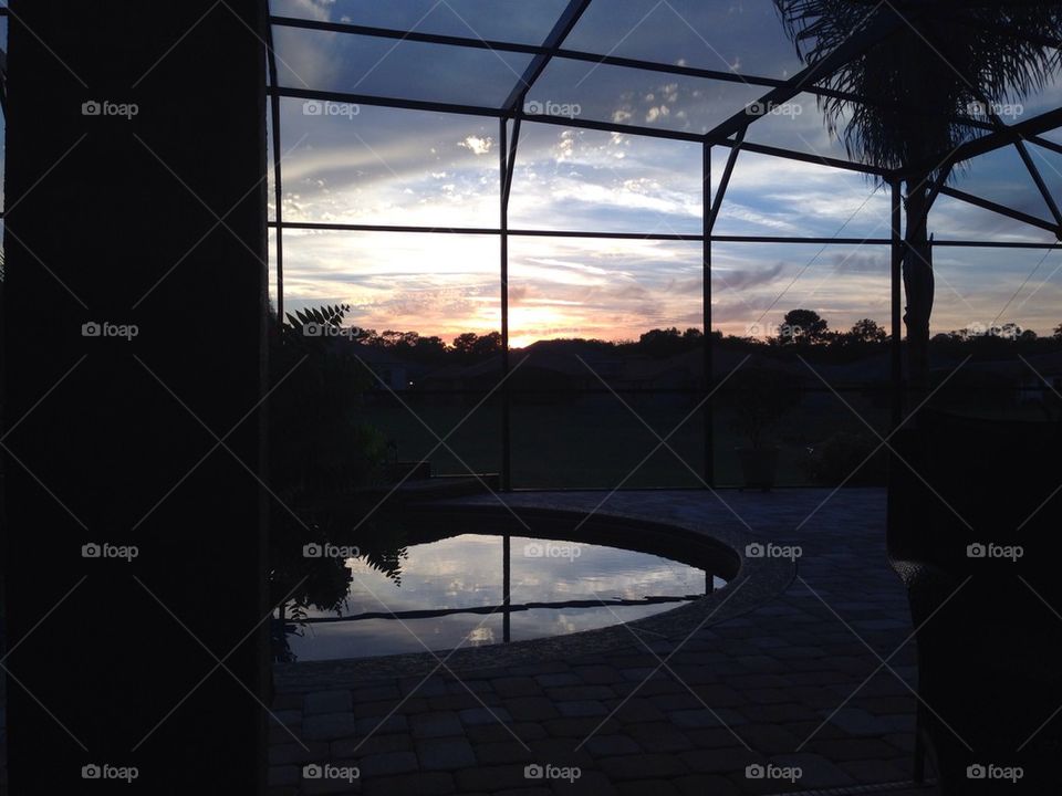 Sunset over pool