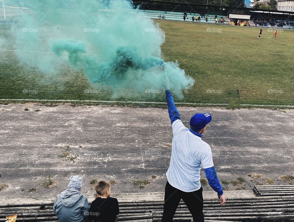 Football fan from behind