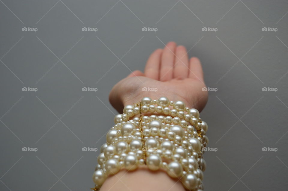 Women's hand wearing bracelet