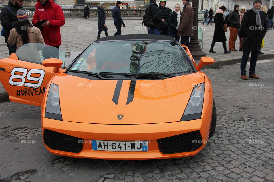 Orange Lamborghini at the street