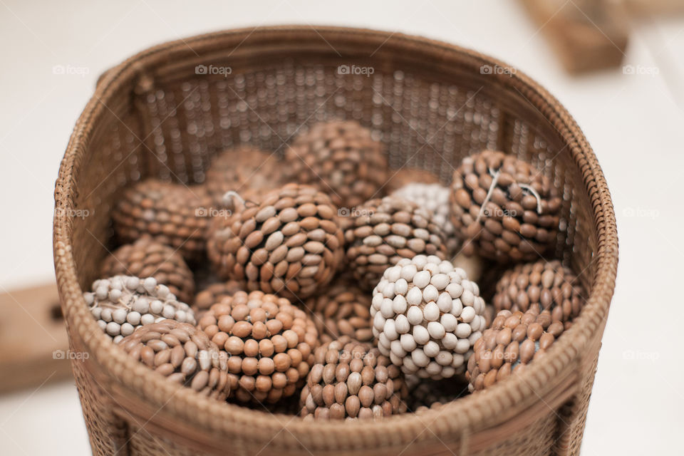 Group of pine cone made from bead in the basket