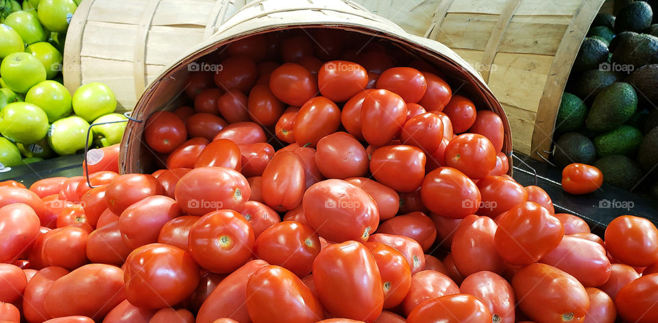 Vegetables and fruit in a basket.