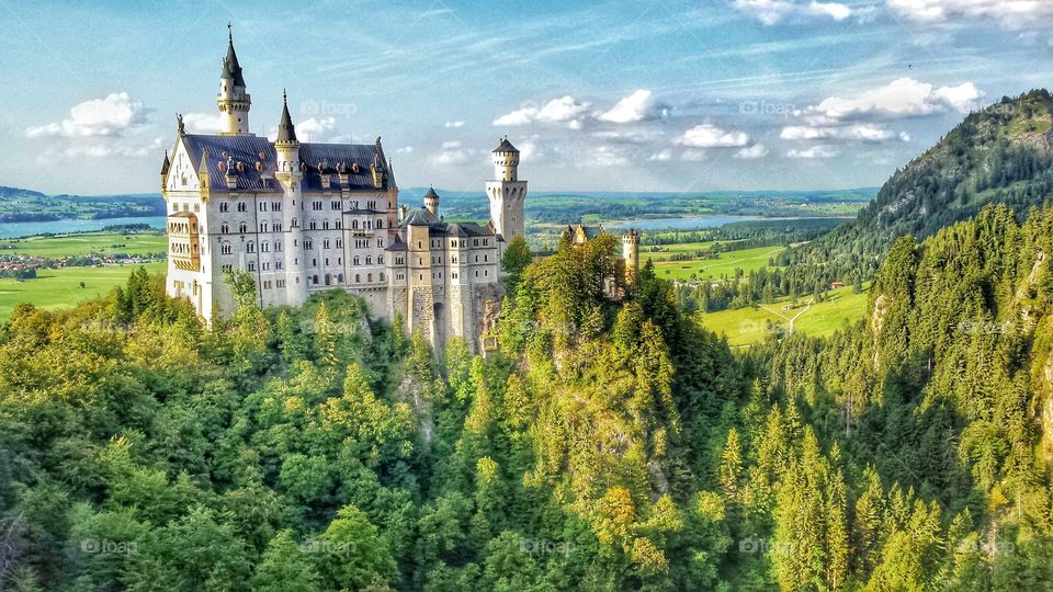 A world of fairytales, castles, knights and princesses in Bavaria , Germany. Traveling through the hills of Neuschwanstein castle , takes you in a world of dreams