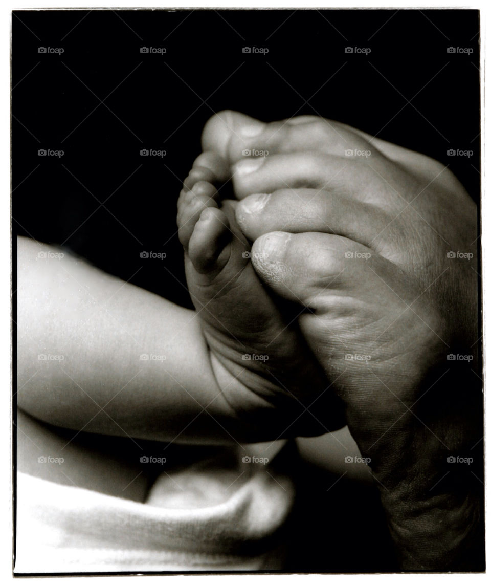 baby mother feet newborn by jbrinkler