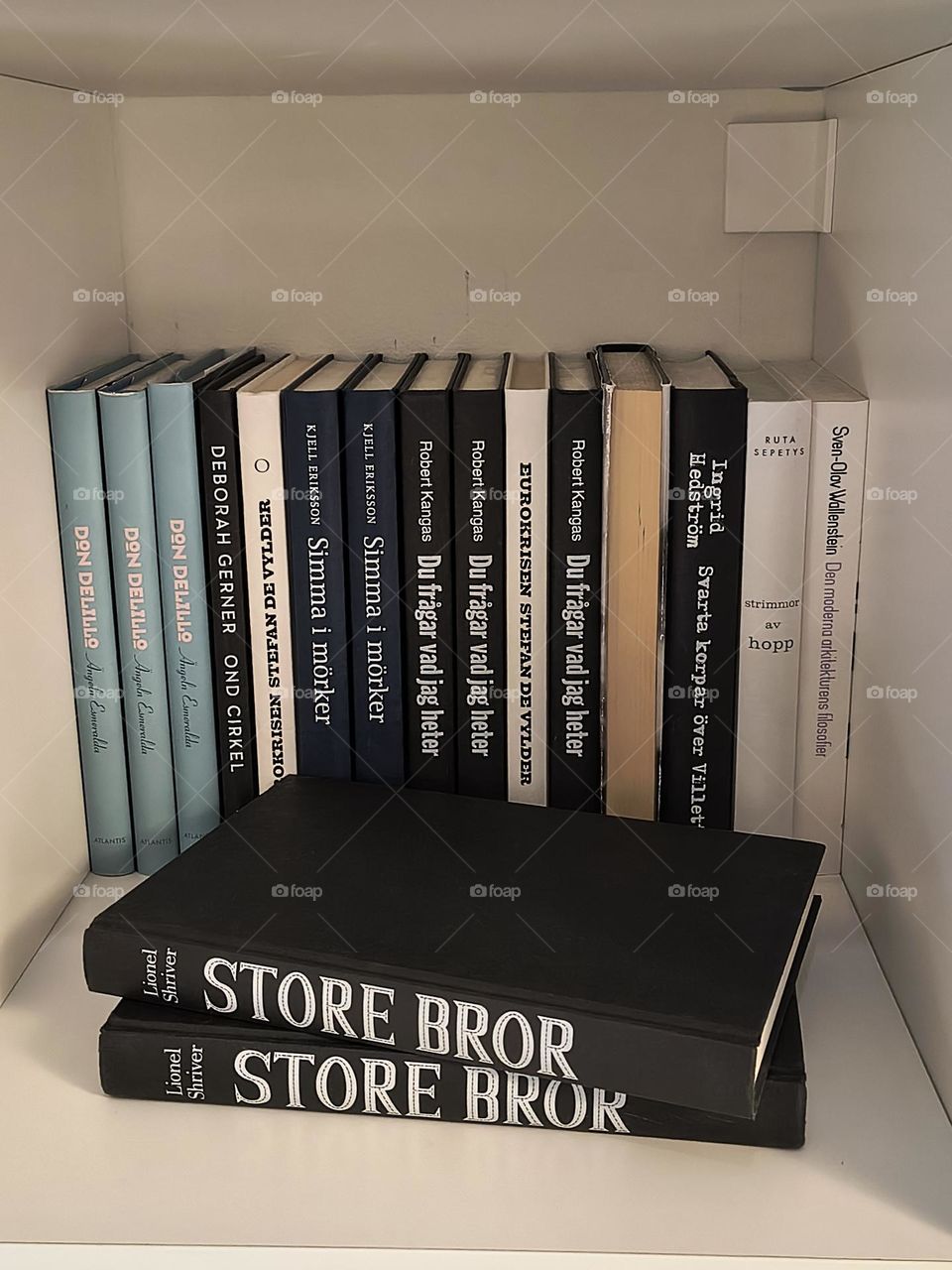 The shelf loaded with time and words.