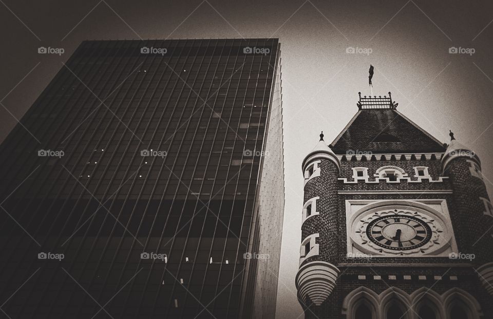 Old architecture, called Perth Town Hall and contemporary style building in Perth, Western Australia.